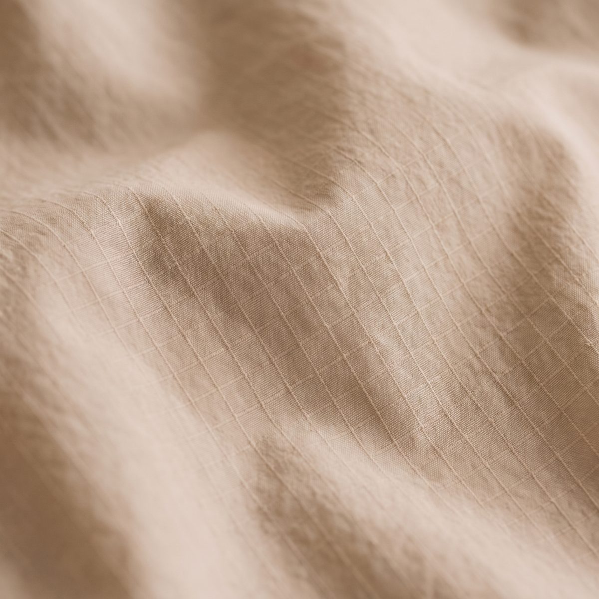 Close-up of nylon-spandex ripstop, oat
