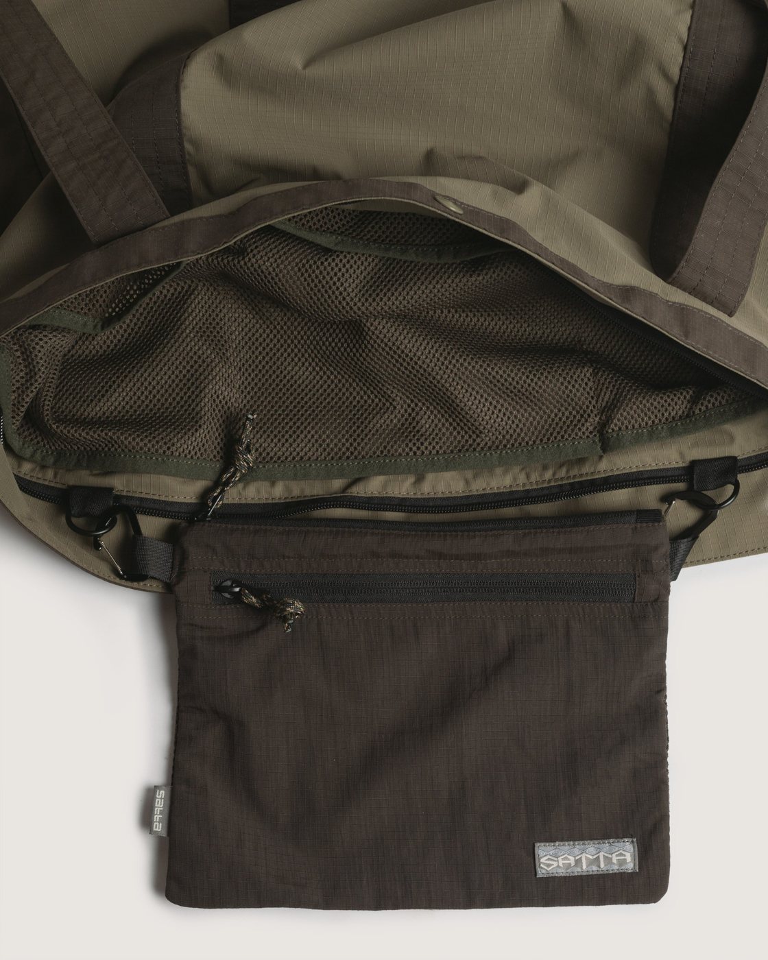 Inside the ripstop tote, zip pouch