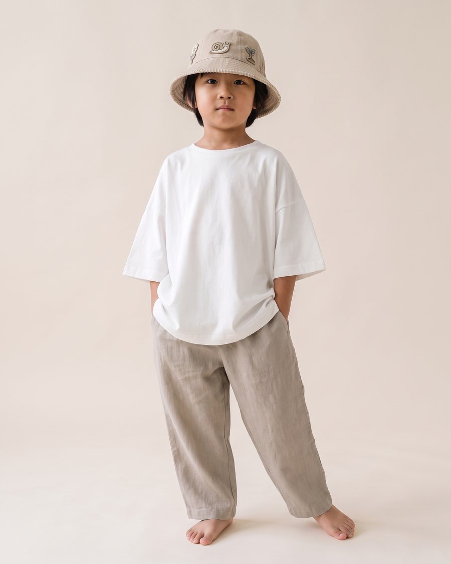 Stella McCartney Kids SS23 Patchwork Sun Bucket Hat, on model