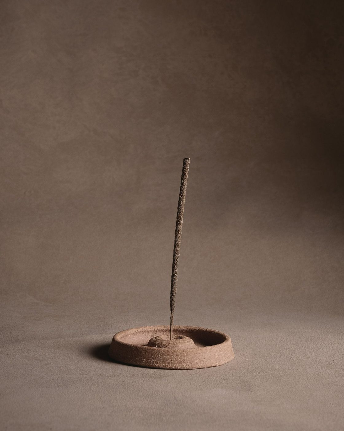 Wheel-thrown incense holder in unglazed terracotta