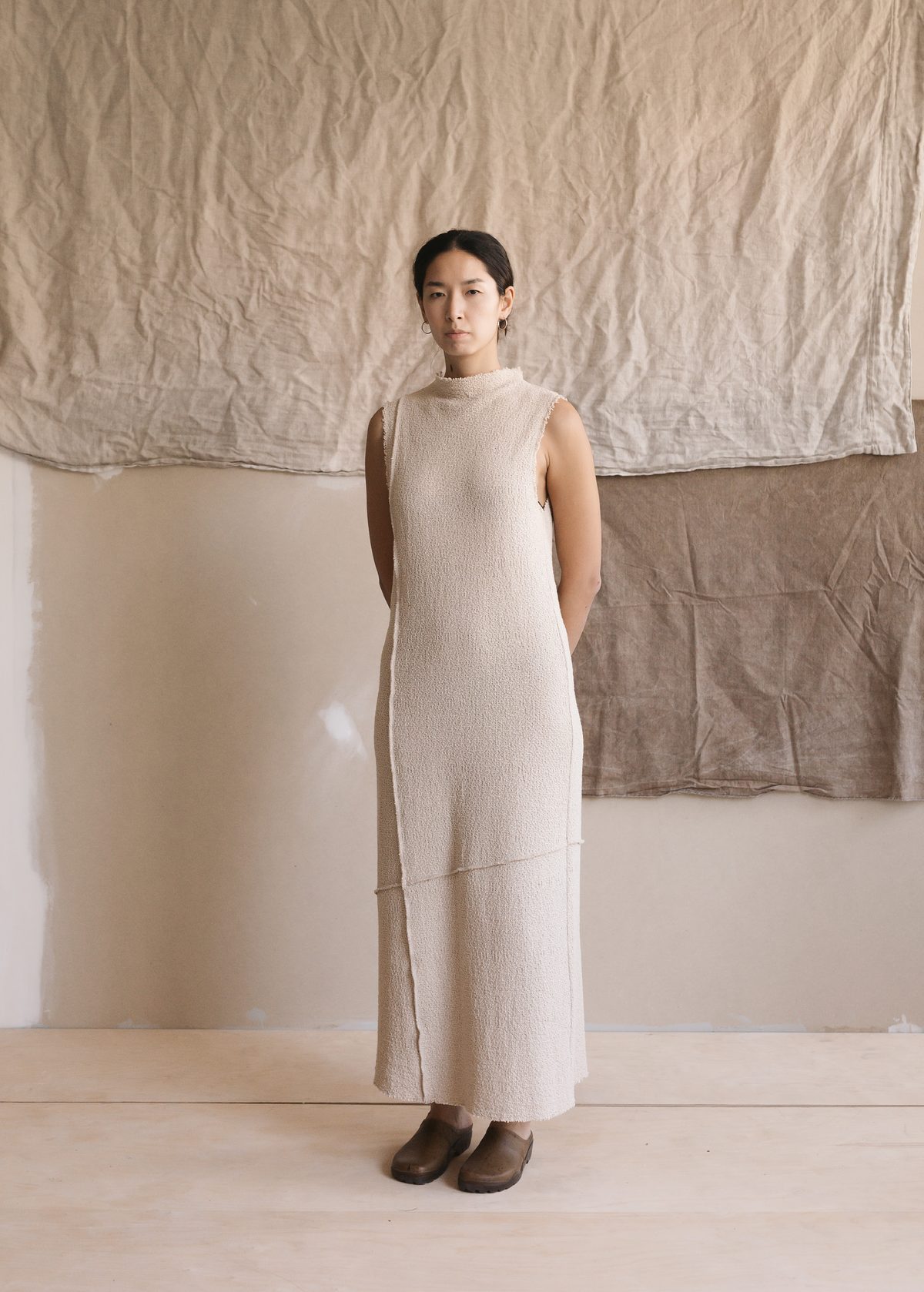 Sleeveless ecru knit dress