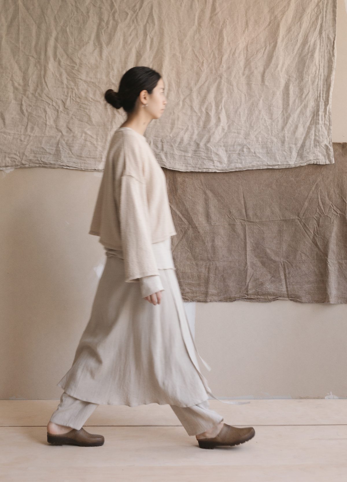 Cropped knit and wide trousers, walking